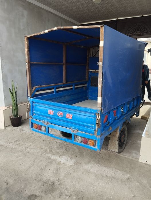 Uch gildirakli skuter