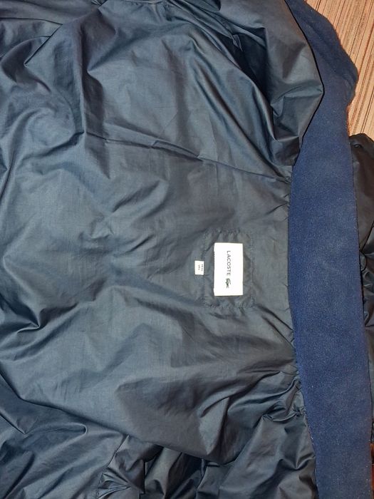 Пуховик лакоста.