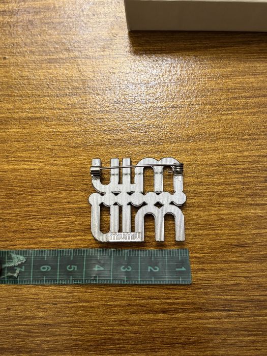 Brosa inscriptionata