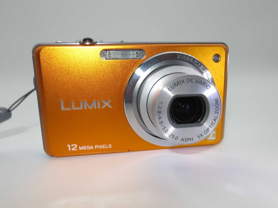 Panasonic Lumix FS10 ултра компактен цифров фотоапарат, дигитална камера, оранжев метален цвят, НОВА работи отлично!