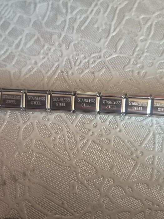 Гривна Nomination.