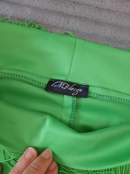 Pantaloni eleganti cu franjuri