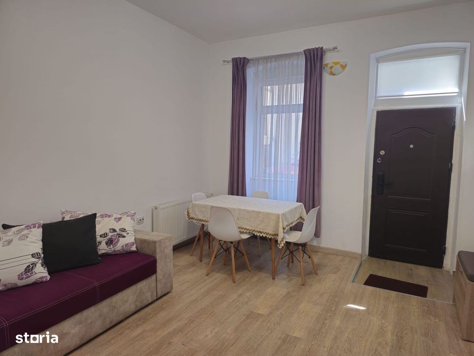 Casa finisata la curte comuna, 56 mp, 2 camere - zona Centrala