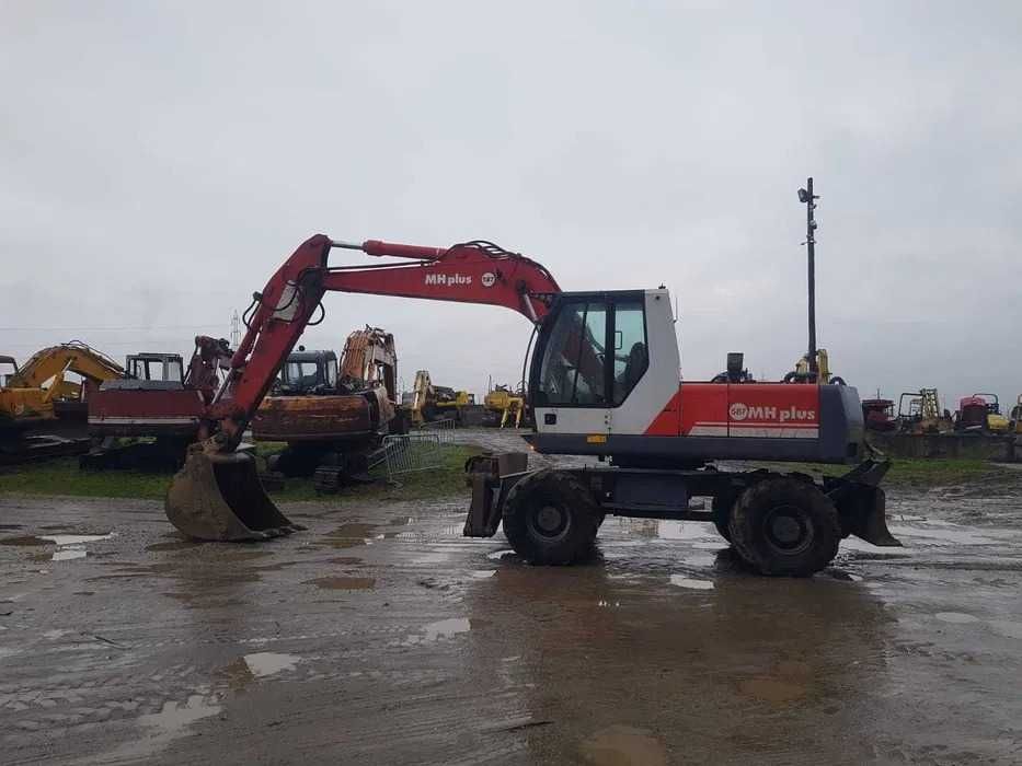 Dezmembrez excavator pe roti OK MH PLUS-piese de schimb OK