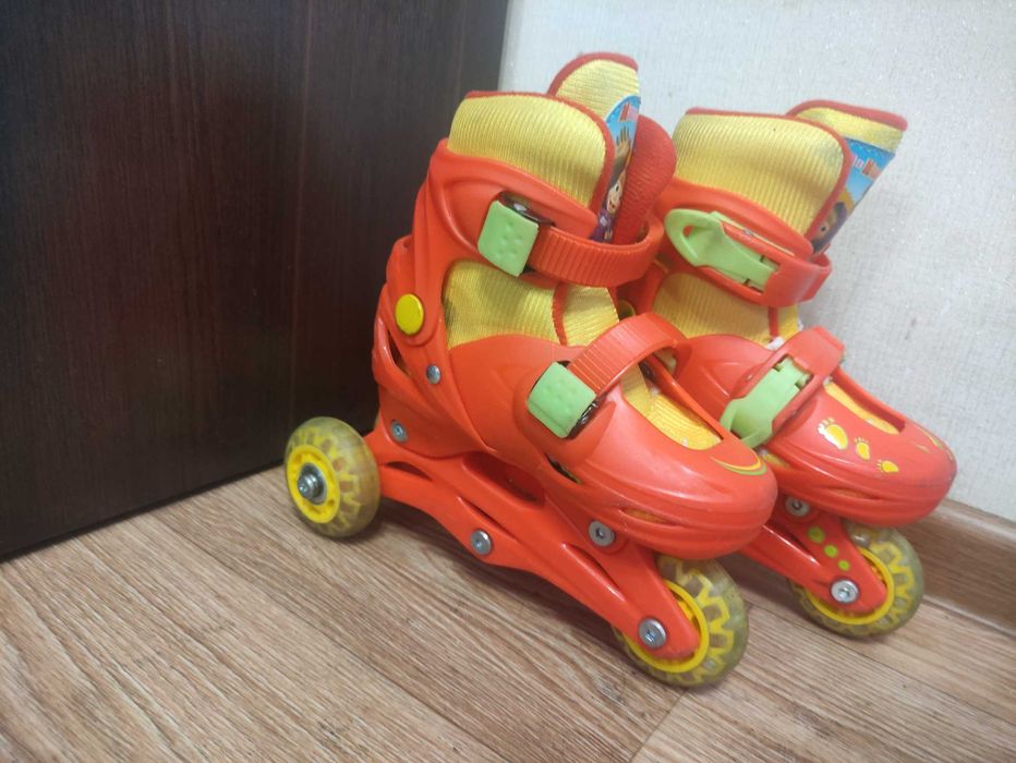 Роликовые коньки