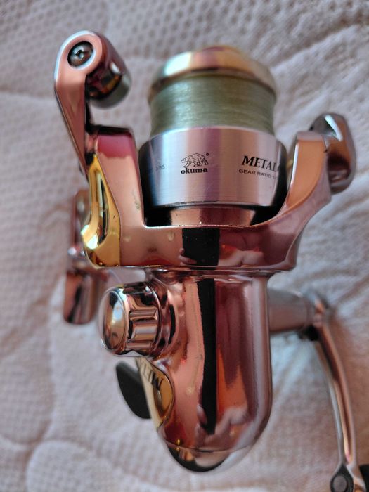 Макара Okuma Metaloid