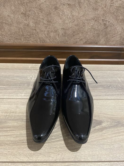 Tufli London dan kelgan