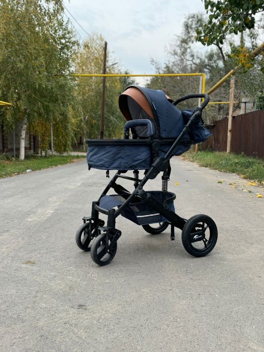 Детская прогулочная коляска трансформер
