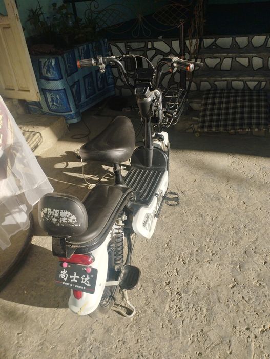 Электро скутер сотилади холати яхши Бир йил минилган хамма жойи соз ке