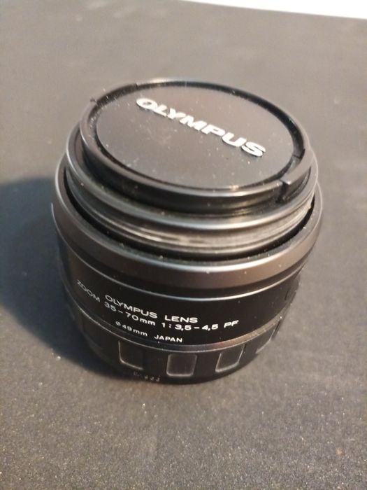 Olympus OM‑10 + 3 obiective + flash + geantă + accesorii – funcțional