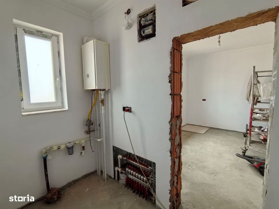 Casă nouă cu 3 camere,2 bai și curte privată imprejmuita si amenajata.