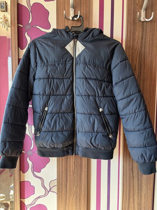 Яке марка Okaidi 152 см