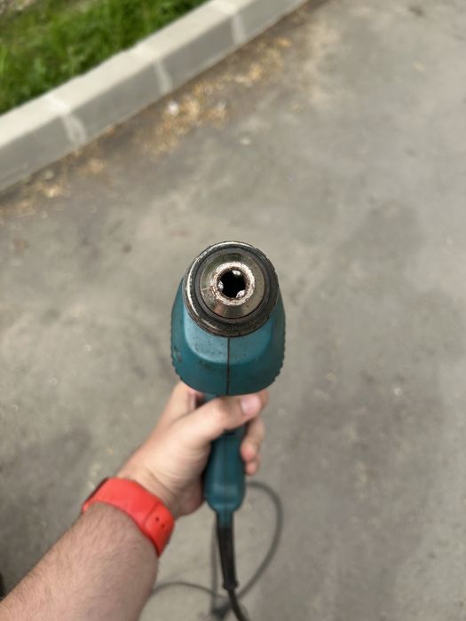 Bormaşină cu percuție