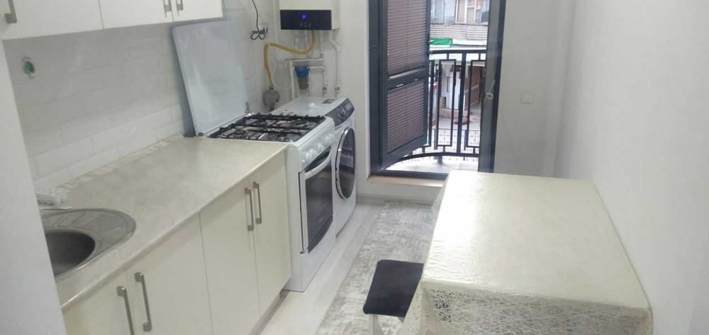 In the Yashnabad district, a two-room apartment is for rent.