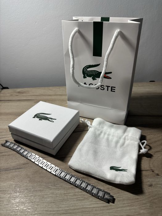 Bratara Lacoste purata de doua ori