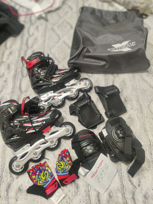 Коньки роликовые