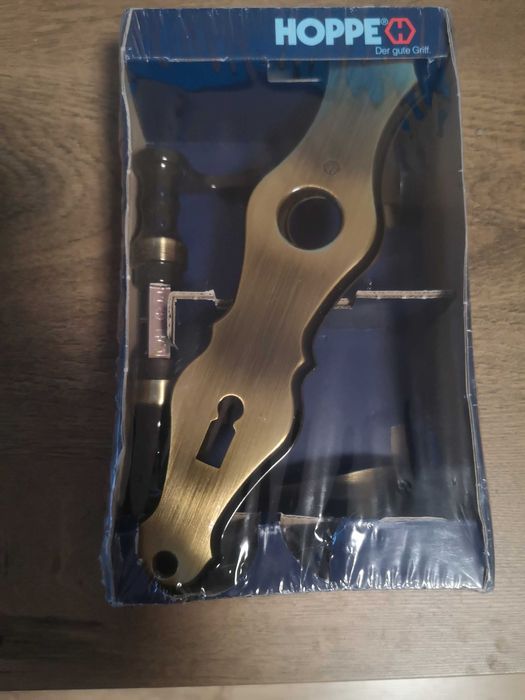 Maner usa interior, HOPPE Munchen, cu slid pentru cheie, alama