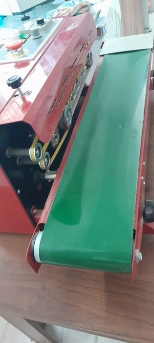 Роликовый конвейерный запайщик горизонтальный