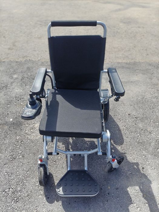 Нвалидная коляска с электроприводом.