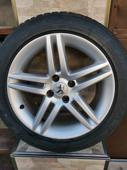 Джанти с гуми за Пежо