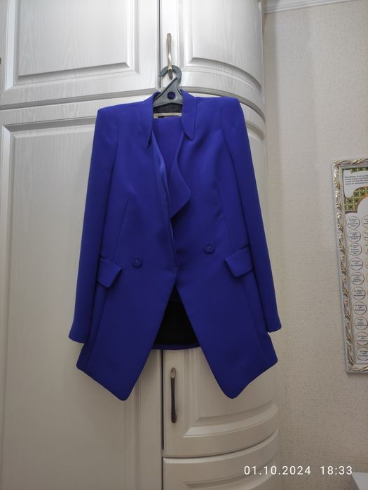 Продам брючной костюм