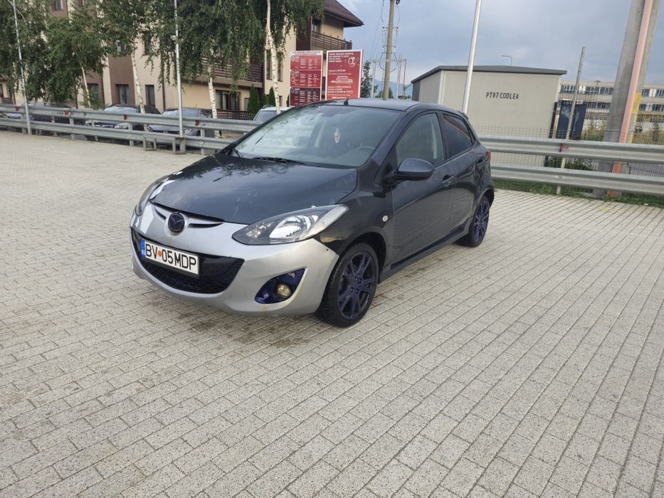 Vând schimb mazda 2 ofer 1500 euro diferenta