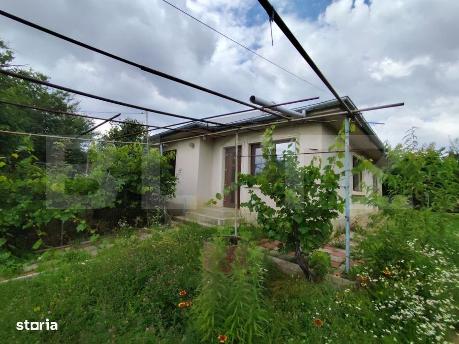 Casa 120 mp utili, 2850 mp teren, zona Bucium