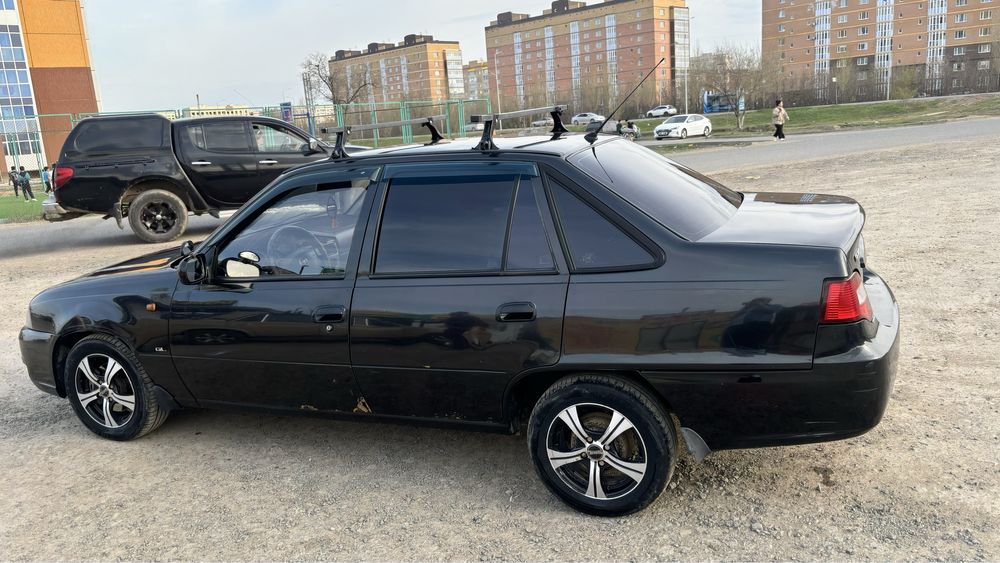 Машина дэу нексиа