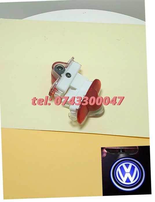 Proiectoare Logo Portiere Vw Golf 4 Caddy Touran Bora Passat
