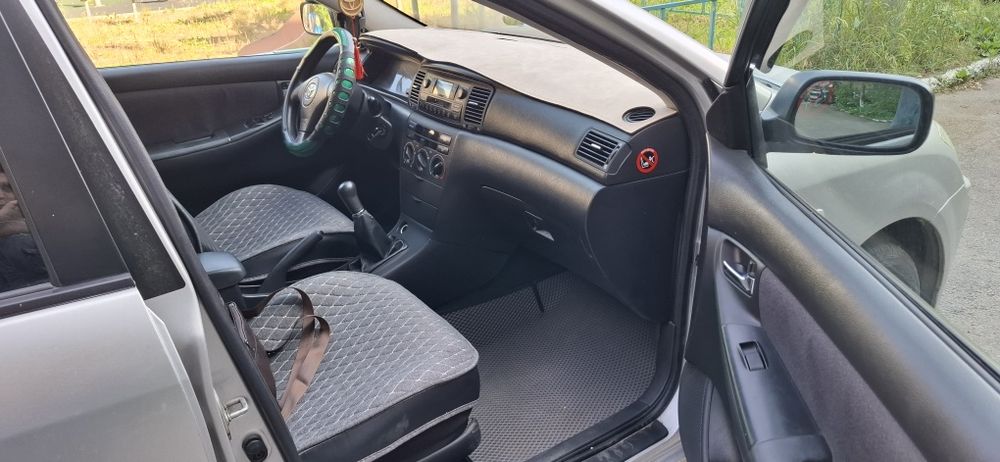 Правая  накидка на панель Тойота Королла