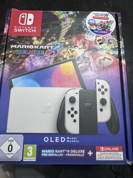 Nintendo Switch Oled + husa şi 3 jocuri incluse aproape nou