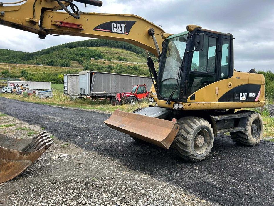 Excavator pe roti CAT M313D