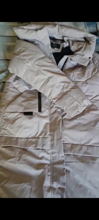 Продам.      куртку     теплая , женская