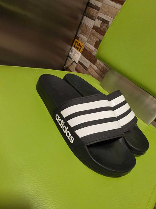 Slapi adidas barbati noi Elvetia