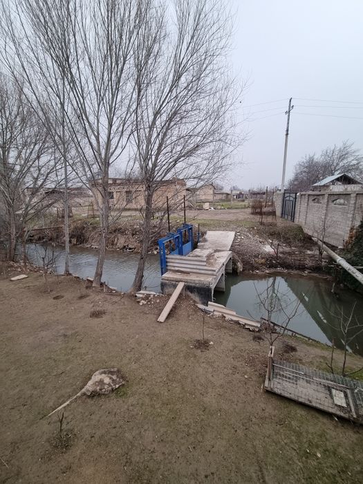 Дормон дом участок. Кибрай район. На берегу реки. 6.7 соток. Ттз