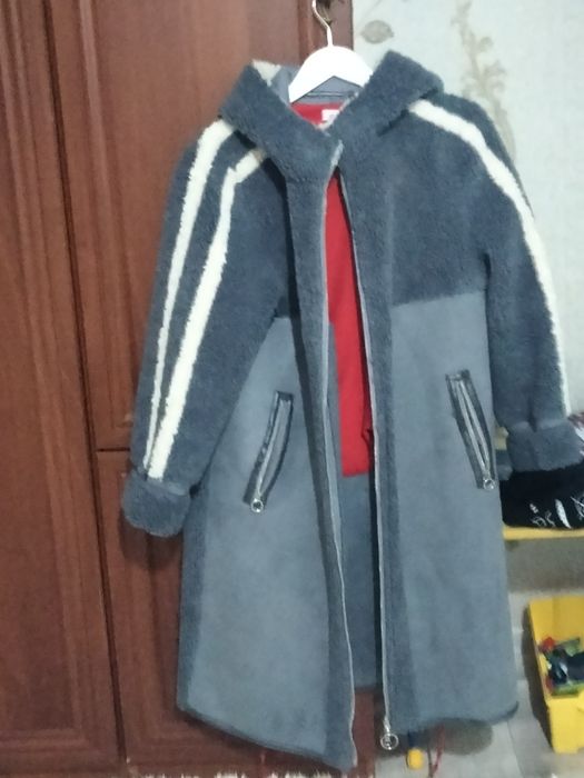 Тёплое пальто с меховой отделкой