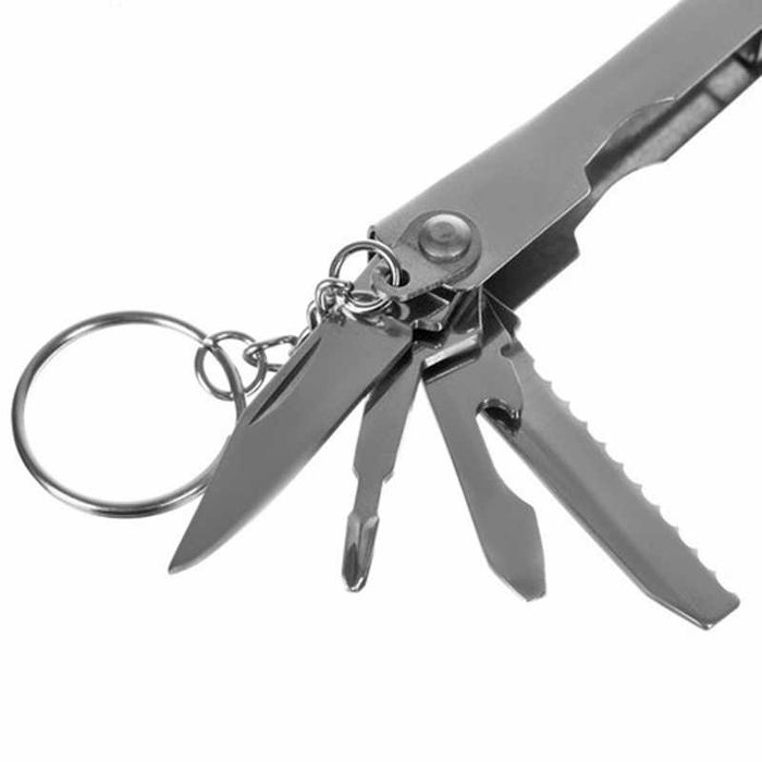 Комплект оцеляване SURVIVAL 7в1 компас клещи свирка нож трион фенерче