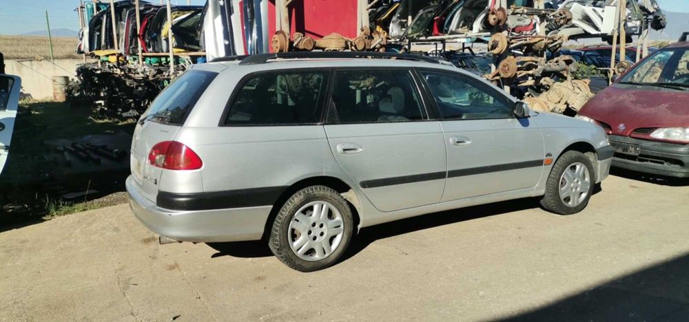 Тойота Авенсис .