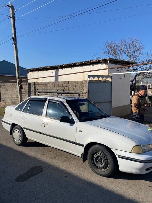 Нексия 1999 йилги юриб турибти қогани тел гаплашамиз 2500 келишамиз