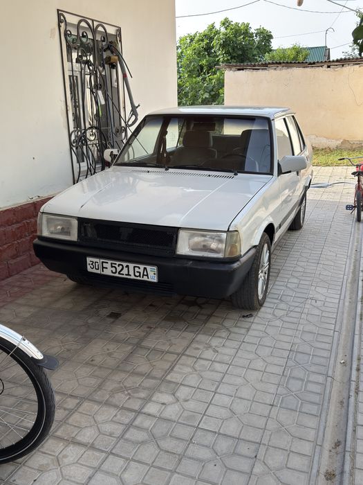 Tofash Dogan 1995 yil