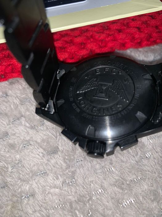 Longines Conquest V.H.P. Chronograph watch in black PVD with a blue.