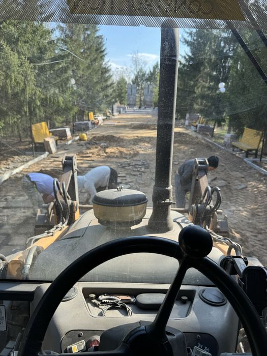 Услуги Эксковатор-погрузчик