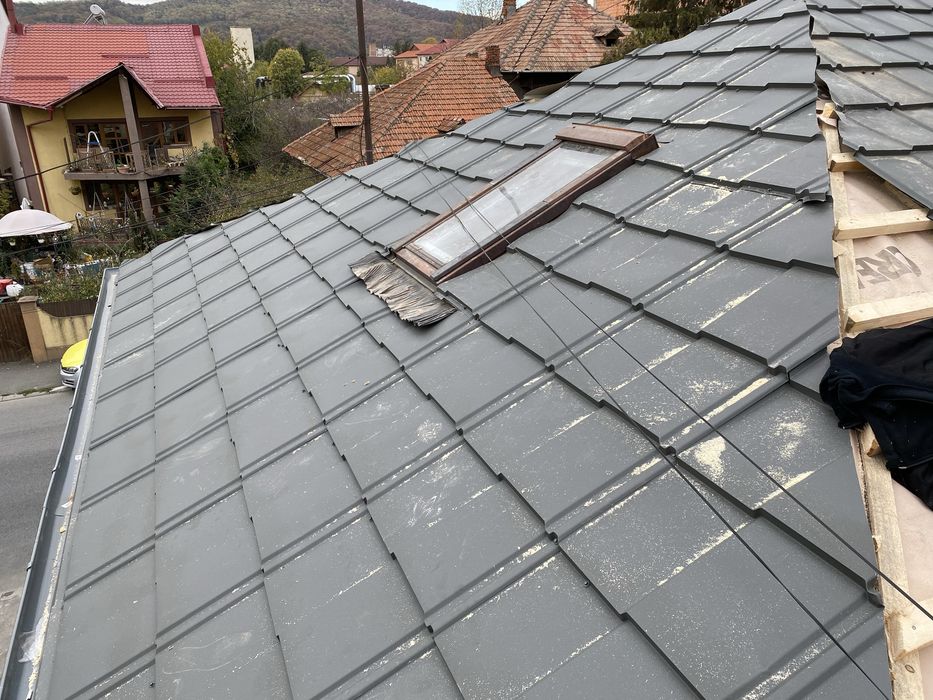 Montaj acoperisuri reparatii tigla metalica dulgherie terase jgheaburi