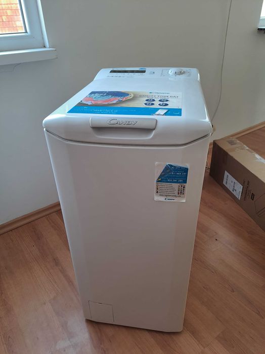 Пералня Candy с горно пълнене