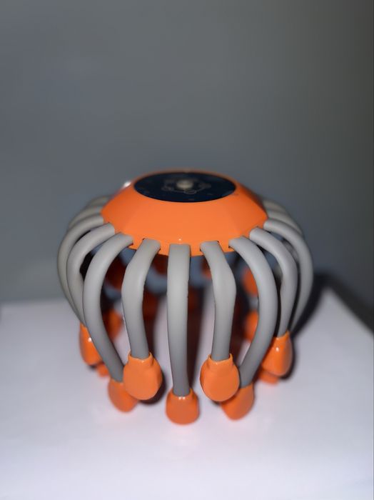 Интелигентен масажор за глава