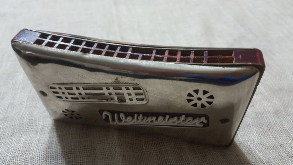 Двустранна хармоника Weltmeister и .Проф. немска стойка за ноти