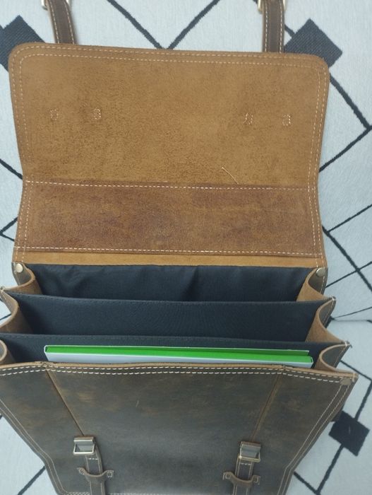 Продам новый рюкзак кожаный .