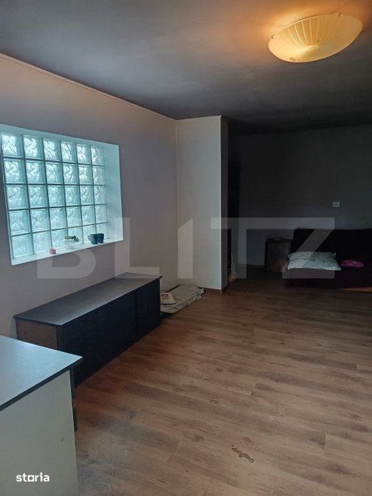 Casa renovabila,  cu un teren 2000 m,  intr-o zona linistita!