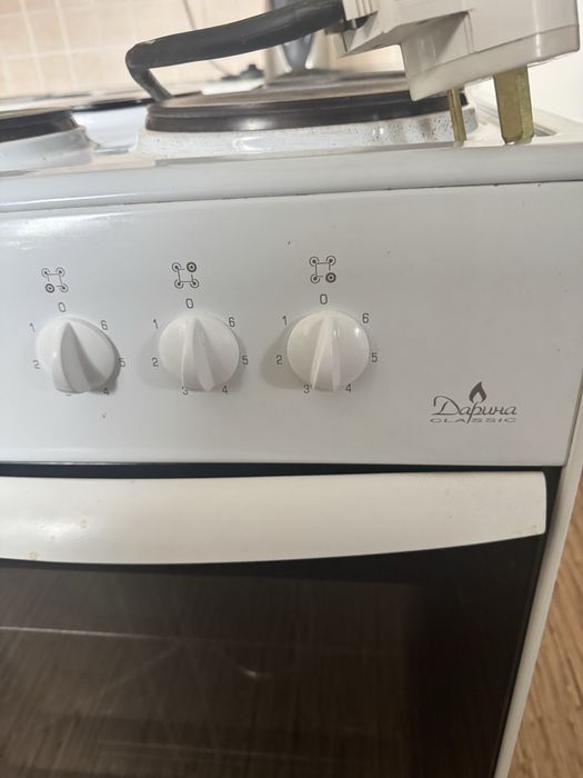 Электроплита с духовкой