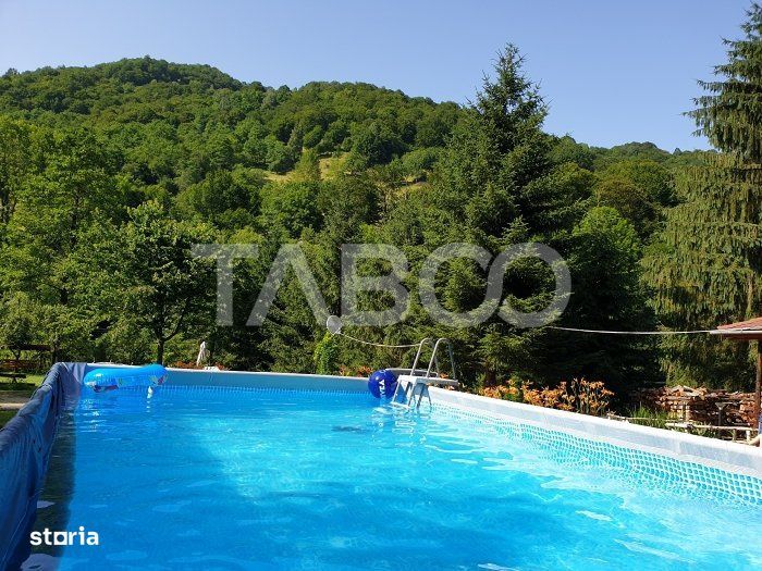 Pensiune de lux de vanzare in inima padurii langa Sibiu